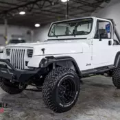 1991 White Jeep Wrangler thumbnail