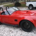 1965 Red Shelby Cobra thumbnail