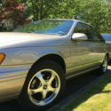 1994 Champagne Beige Ford Taurus thumbnail