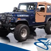 1985 Blue Jeep CJ thumbnail