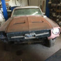 1968 primer red Ford Mustang thumbnail