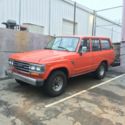 1989 Orange Toyota Land Cruiser thumbnail