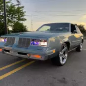 1985 Blue Oldsmobile Cutlass thumbnail