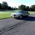 1994 Gold Cadillac Brougham thumbnail