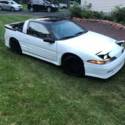 1990 White Plymouth Laser thumbnail