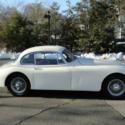 1960 Cream Jaguar XK thumbnail