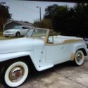 1950 antique white Willys  thumbnail