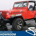 1989 Red Jeep Wrangler thumbnail