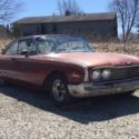 1960 Red Ford Starliner thumbnail